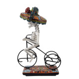 Ciclista catrina - traditional figure of La Catrina on a bicycle