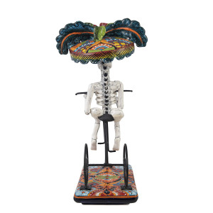 Ciclista catrina - traditional figure of La Catrina on a bicycle
