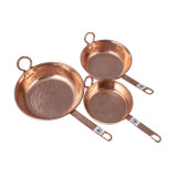 Set of copper pans from Mexico