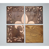 Copper wall tiles with Fleur de lis pattern